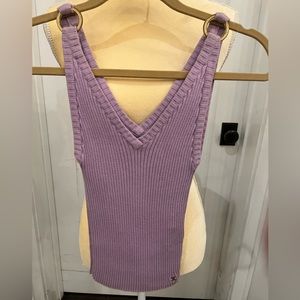 CHANEL lavender knitted cotton top size 36. It’s been dry cleaned.